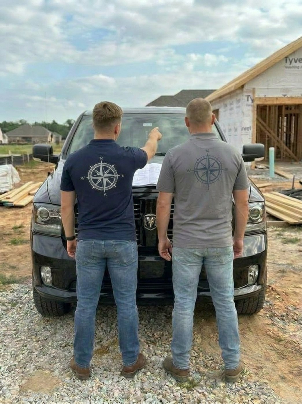 Vanguard Build team reviewing plans on-site at a Tampa Bay construction project